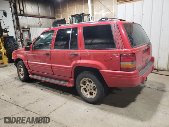 1996 Jeep Grand Cherokee Limited with VIN 1J4GZ78Y3TC186413, listed as a Copart auction lot 82370854 with 261,630 mi miles and Salvage Title. Bid and sale history available at carsss.com. Image 2.