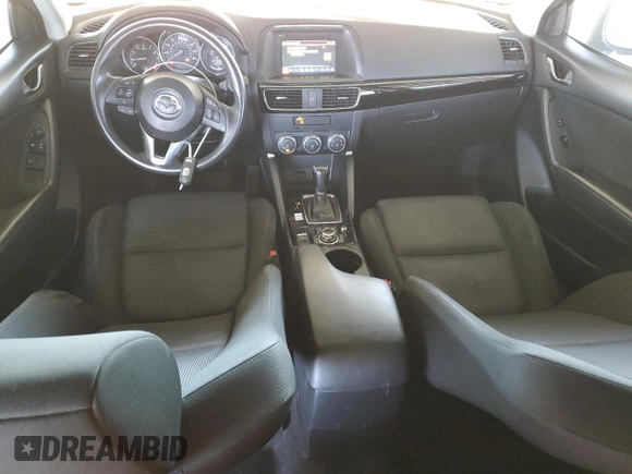 2016 Mazda CX-5 Sport with VIN JM3KE2BY8G0837203, listed as a Copart auction lot 54960845 with 116,656 mi miles and Salvage title. Bid and sale history available at DreamBid. Image 8.