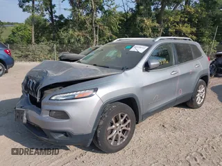2016 Jeep Cherokee Altitude with VIN 1C4PJMCB0GW108819, listed as a IAAI auction lot 40198342 with 128,949 mi miles and . Bid and sale history available at DreamBid. Image 12.