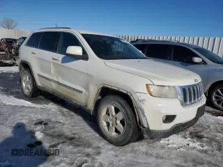 2012 Jeep Grand Cherokee Laredo with VIN 1C4RJFAG2CC267890, listed as a Copart auction lot 87832115 with 171,552 mi miles and Salvage Title. Bid and sale history available at carsss.com. Image 4.