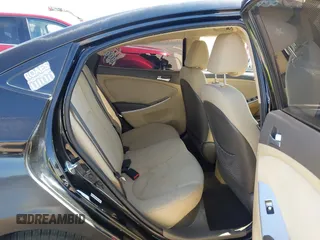 2014 Hyundai Accent GLS with VIN KMHCT4AE2EU749061, listed as a IAAI auction lot 42017566 with 93,929 mi miles. Bid and sale history available at carsss.com. Image 8.