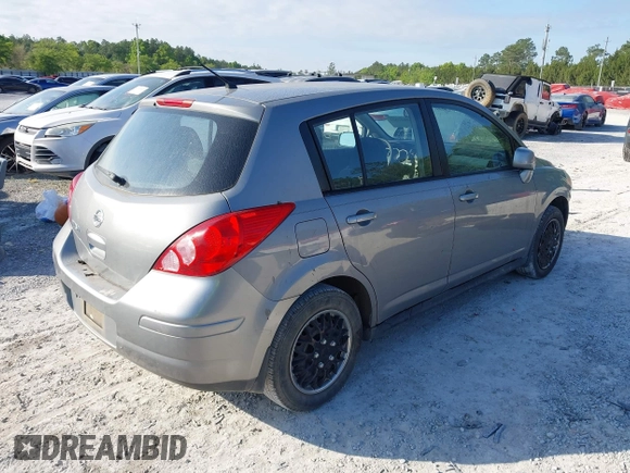 2012 Nissan Versa S with VIN 3N1BC1CP8CK242212, listed as a IAAI auction lot 42027327 with 117,118 mi miles. Bid and sale history available at carsss.com. Image 4.