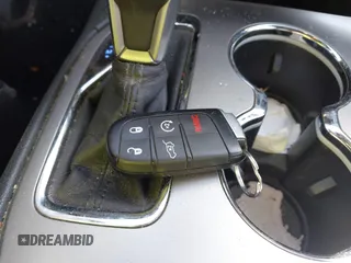 2019 Jeep Grand Cherokee Laredo E with VIN 1C4RJFAG6KC661777, listed as a IAAI auction lot 41762646 with 103,547 mi miles. Bid and sale history available at carsss.com. Image 11.