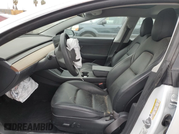 2020 Tesla Model 3 Standard Range Plus with VIN 5YJ3E1EA5LF747010, listed as a Copart auction lot 50937975 with Not Provided miles and Salvage Title. Bid and sale history available at DreamBid. Image 7.