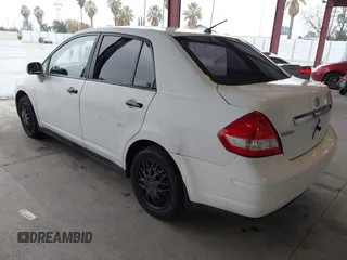 2010 Nissan Versa 1.8 S with VIN 3N1BC1AP7AL414885, listed as a IAAI auction lot 41484047 with 200,905 mi miles. Bid and sale history available at carsss.com. Image 3.