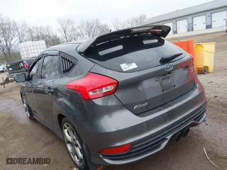 2015 Ford Focus ST with VIN 1FADP3L93FL321830, listed as a IAAI auction lot 41835529 with 106,901 mi miles. Bid and sale history available at carsss.com. Image 3.