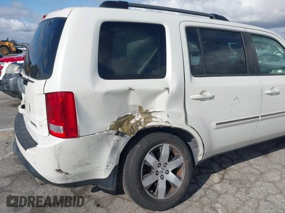 2015 Honda Pilot Touring with VIN 5FNYF3H93FB007766, listed as a IAAI auction lot 41932052 with 131,036 mi miles. Bid and sale history available at carsss.com. Image 6.