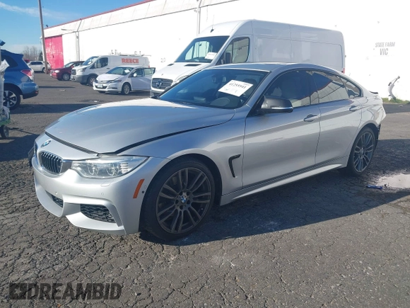 2015 BMW 4 Series 428i with VIN WBA4A5C58FG051293, listed as a IAAI auction lot 41255541 with 60,737 mi miles and . Bid and sale history available at DreamBid. Image 2.