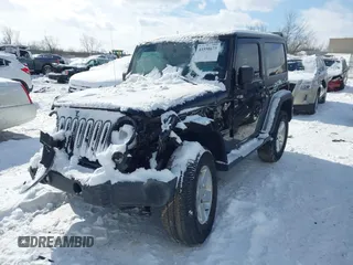 2014 Jeep Wrangler Sport with VIN 1C4AJWAG5EL285994, listed as a IAAI auction lot 41558673 with 98,779 mi miles and . Bid and sale history available at DreamBid. Image 16.