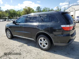 2012 Dodge Durango Crew with VIN 1C4RDHDG3CC265631, listed as a Copart auction lot 53474095 with 187,745 mi miles and Salvage Title. Bid and sale history available at DreamBid. Image 2.