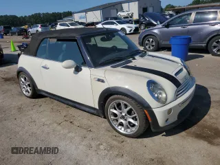 2006 MINI Convertible S с VIN WMWRH33546TF85908, выставлен на аукционе Copart как лот 61363025 с пробегом 105 053 миль миль и Списание • Salvage title. История ставок и продаж доступна на DreamBid. Изображение 4.