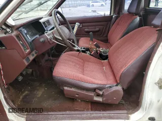 1990 Nissan Frontier with VIN 1N6SD16S9LC404281, listed as a Copart auction lot 84214904 with 279,270 mi miles and Salvage title. Bid and sale history available at DreamBid. Image 7.