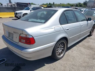 2001 BMW 5 Series 530iA with VIN WBADT63411CF01165, listed as a IAAI auction lot 42101589 with 151,243 mi miles. Bid and sale history available at carsss.com. Image 4.