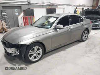2017 BMW 3 Series 330i xDrive with VIN WBA8D9C32HA011795, listed as a IAAI auction lot 41789050 with 65,522 mi miles and . Bid and sale history available at DreamBid. Image 2.