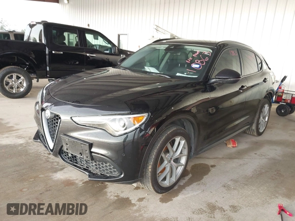 2018 Alfa Romeo Stelvio Sport z VIN ZASFAKPN9J7B70085, wystawiony jako IAAI lot #40823547 z przebiegiem Nie podano mil oraz . Historia ofert i sprzedaży dostępna na DreamBid. Obrazek 17.