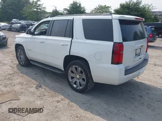 2017 Chevrolet Tahoe LT z VIN 1GNSKBKC2HR330422, wystawiony jako IAAI lot #42419205 z przebiegiem 136 444 mil mil oraz . Historia ofert i sprzedaży dostępna na DreamBid. Obrazek 3.