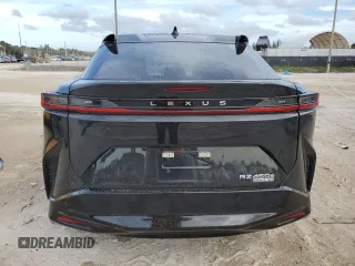 2023 Lexus RZ 450e Premium z VIN JTJAAAAB4PA005937, wystawiony jako Copart lot #39939654 z przebiegiem 6136 mil mil oraz . Historia ofert i sprzedaży dostępna na DreamBid. Obrazek 6.