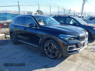 2023 BMW X5 sDrive40i with VIN 5UXCR4C00P9P46054, listed as a IAAI auction lot 41627025 with 20,152 mi miles. Bid and sale history available at carsss.com. Image 1.