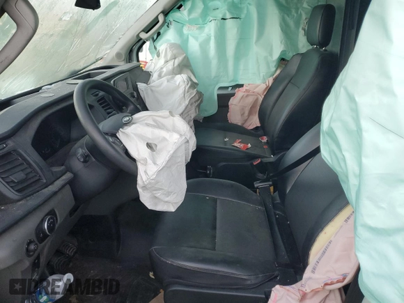 2022 Ford Transit Cargo z VIN 1FTBR1X8XNKA23913, wystawiony jako Copart lot #82981284 z przebiegiem Nie podano mil oraz Szkoda całkowita • Salvage title. Historia ofert i sprzedaży dostępna na DreamBid. Obrazek 5.