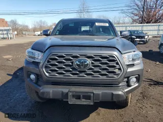 2023 Toyota Tacoma 4WD SR with VIN 3TMCZ5AN5PM552045, listed as a Copart auction lot 46682005 with 20,023 mi miles and Salvage Title. Bid and sale history available at carsss.com. Image 5.