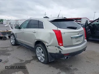 2014 Cadillac SRX Performance Collection z VIN 3GYFNCE35ES610504, wystawiony jako IAAI lot #42133548 z przebiegiem 140 306 mil mil oraz . Historia ofert i sprzedaży dostępna na DreamBid. Obrazek 3.