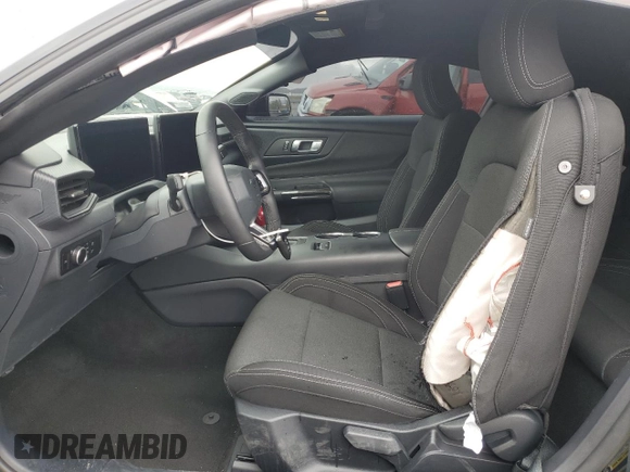 2024 Ford Mustang GT with VIN 1FA6P8CF3R5411497, listed as a Copart auction lot 55979545 with 6,607 mi miles and Salvage title. Bid and sale history available at DreamBid. Image 7.