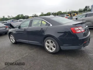 2016 Ford Taurus SEL with VIN 1FAHP2E88GG137607, listed as a Copart auction lot 61356505 with 33,768 mi miles and Salvage title. Bid and sale history available at DreamBid. Image 2.
