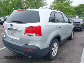2012 Kia Sorento LX with VIN 5XYKTDA60CG296159, listed as a IAAI auction lot 42197638 with 198,676 mi miles and . Bid and sale history available at carsss.com. Image 4.