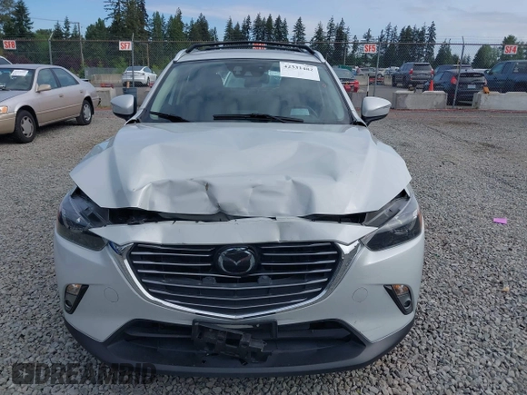 2017 Mazda CX-3 Grand Touring z VIN JM1DKFD70H0159621, wystawiony jako IAAI lot #42331482 z przebiegiem 55 166 mil mil oraz . Historia ofert i sprzedaży dostępna na DreamBid. Obrazek 6.
