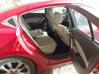 2016 Mazda Mazda6 i Touring with VIN JM1GJ1V58G1425881, listed as a IAAI auction lot 41786149 with 114,638 mi miles. Bid and sale history available at carsss.com. Image 8.