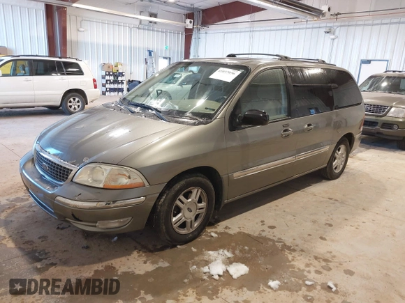 2003 Ford Windstar SE with VIN 2FMZA52413BB09700, listed as a IAAI auction lot 41037056 with 179,486 mi miles and . Bid and sale history available at DreamBid. Image 2.