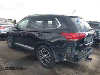 2016 Mitsubishi Outlander GT with VIN JA4JZ4AX0GZ033187, listed as a IAAI auction lot 41356040 with 100,462 mi miles and . Bid and sale history available at DreamBid. Image 3.