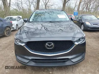 2020 Mazda CX-5 Touring with VIN JM3KFBCM1L0792396, listed as a IAAI auction lot 41949124 with 118,280 mi miles. Bid and sale history available at carsss.com. Image 12.