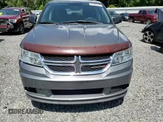 2013 Dodge Journey American Value with VIN 3C4PDCAB8DT566999, listed as a Copart auction lot 61361315 with 183,897 mi miles and Salvage title. Bid and sale history available at DreamBid. Image 14.