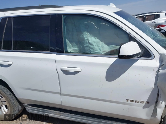 2015 Chevrolet Tahoe LS with VIN 1GNSCAKC3FR687421, listed as a IAAI auction lot 41930895 with Not provided miles and . Bid and sale history available at DreamBid. Image 13.