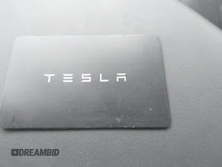 2023 Tesla Model 3 with VIN 5YJ3E1EA4PF644621, listed as a IAAI auction lot 42280312 with 41,262 mi miles and . Bid and sale history available at DreamBid. Image 11.