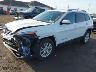 2015 Jeep Cherokee Latitude with VIN 1C4PJMCB5FW553023, listed as a IAAI auction lot 41757578 with 106,840 mi miles. Bid and sale history available at carsss.com. Image 17.