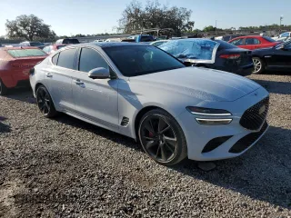 2023 Genesis G70 3.3T with VIN KMTG54TE3PU113251, listed as a Copart auction lot 52675895 with 20,969 mi miles and Salvage title. Bid and sale history available at DreamBid. Image 4.