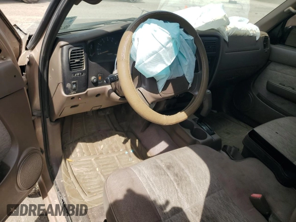 1999 Toyota Tacoma PreRunner with VIN 4TASN92N6XZ563899, listed as a Copart auction lot 50789965 with 184,890 mi miles and Salvage title. Bid and sale history available at DreamBid. Image 8.
