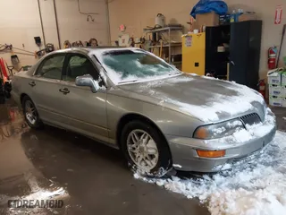 2002 Mitsubishi Diamante LS with VIN 6MMAP67P32T005867, listed as a IAAI auction lot 41586460 with 390,586 mi miles. Bid and sale history available at carsss.com. Image 1.
