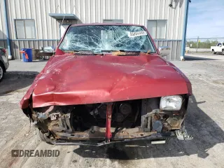1996 Nissan Frontier XE with VIN 1N6SD16S8TC335129, listed as a Copart auction lot 55884495 with 313,757 mi miles and Salvage title. Bid and sale history available at DreamBid. Image 5.