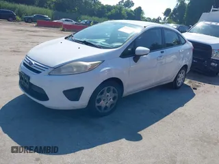 2013 Ford Fiesta S with VIN 3FADP4AJ7DM184180, listed as a IAAI auction lot 42632804 with 176,729 mi miles and . Bid and sale history available at DreamBid. Image 2.