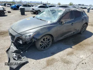 2016 Mazda 3 S Touring with VIN JM1BM1M3XG1342809, listed as a Copart auction lot 61915845 with 141,227 mi miles and Salvage title. Bid and sale history available at DreamBid. Image 1.