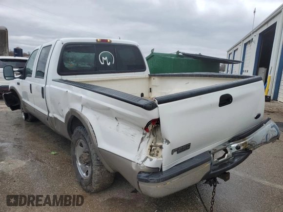 2003 Ford Super Duty F-250 XL with VIN 1FTNW20F23EA78324, listed as a Copart auction lot 87219174 with 407,669 mi miles and Salvage Title. Bid and sale history available at carsss.com. Image 2.