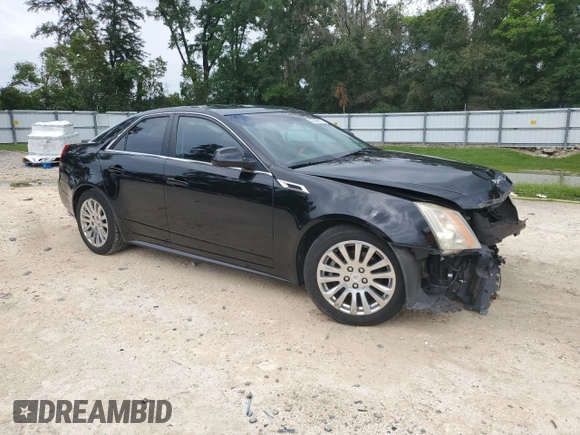 2013 Cadillac CTS Premium with VIN 1G6DP5E34D0112743, listed as a Copart auction lot 63029475 with 132,020 mi miles and Salvage title. Bid and sale history available at DreamBid. Image 4.