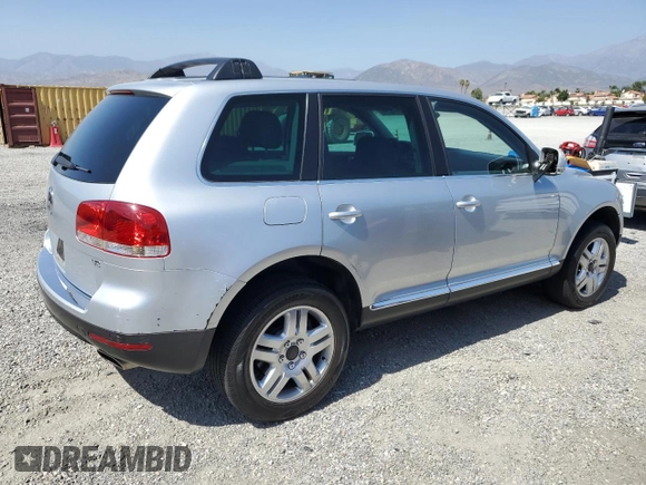 2005 Volkswagen Touareg z VIN WVGCM77L95D014940, wystawiony jako Copart lot #60156795 z przebiegiem 114 551 mil mil oraz Czysty tytuł • Clean title. Historia ofert i sprzedaży dostępna na DreamBid. Obrazek 3.