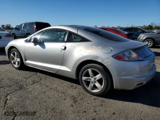 2009 Mitsubishi Eclipse GS with VIN 4A3AK24F19E013670, listed as a Copart auction lot 76370004 with 132,794 mi miles and Salvage Title. Bid and sale history available at carsss.com. Image 2.