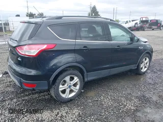 2015 Ford Escape SE with VIN 1FMCU9G98FUA26059, listed as a IAAI auction lot 41991222 with 149,298 mi miles and . Bid and sale history available at DreamBid. Image 4.