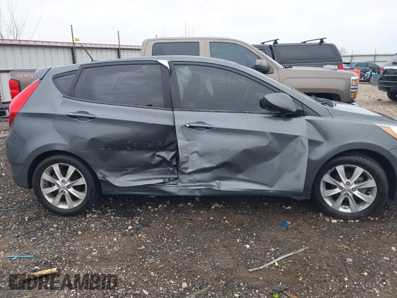 2012 Hyundai Accent SE with VIN KMHCU5AE9CU013458, listed as a IAAI auction lot 41475986 with 88,592 mi miles. Bid and sale history available at carsss.com. Image 13.