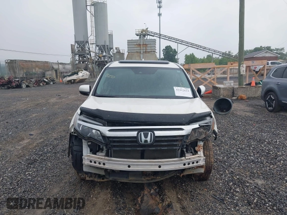 2018 Honda Ridgeline RTL-E with VIN 5FPYK3F77JB017293, listed as a IAAI auction lot 42422614 with 87,700 mi miles and . Bid and sale history available at DreamBid. Image 12.